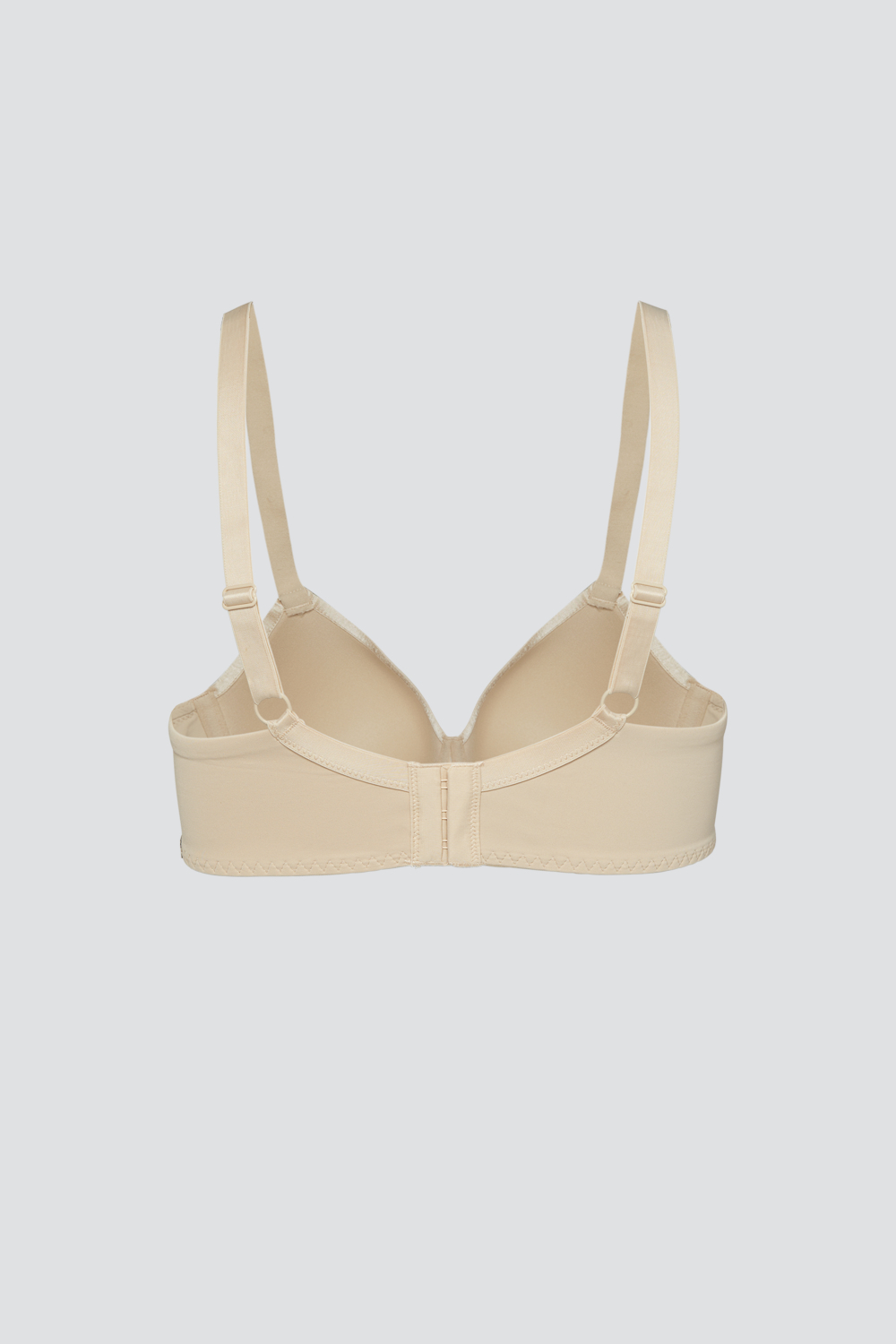 Produktbild Rückansicht Spacer-BH von Comazo in der Farbe Muschel mit schönen Spitzen-Details.