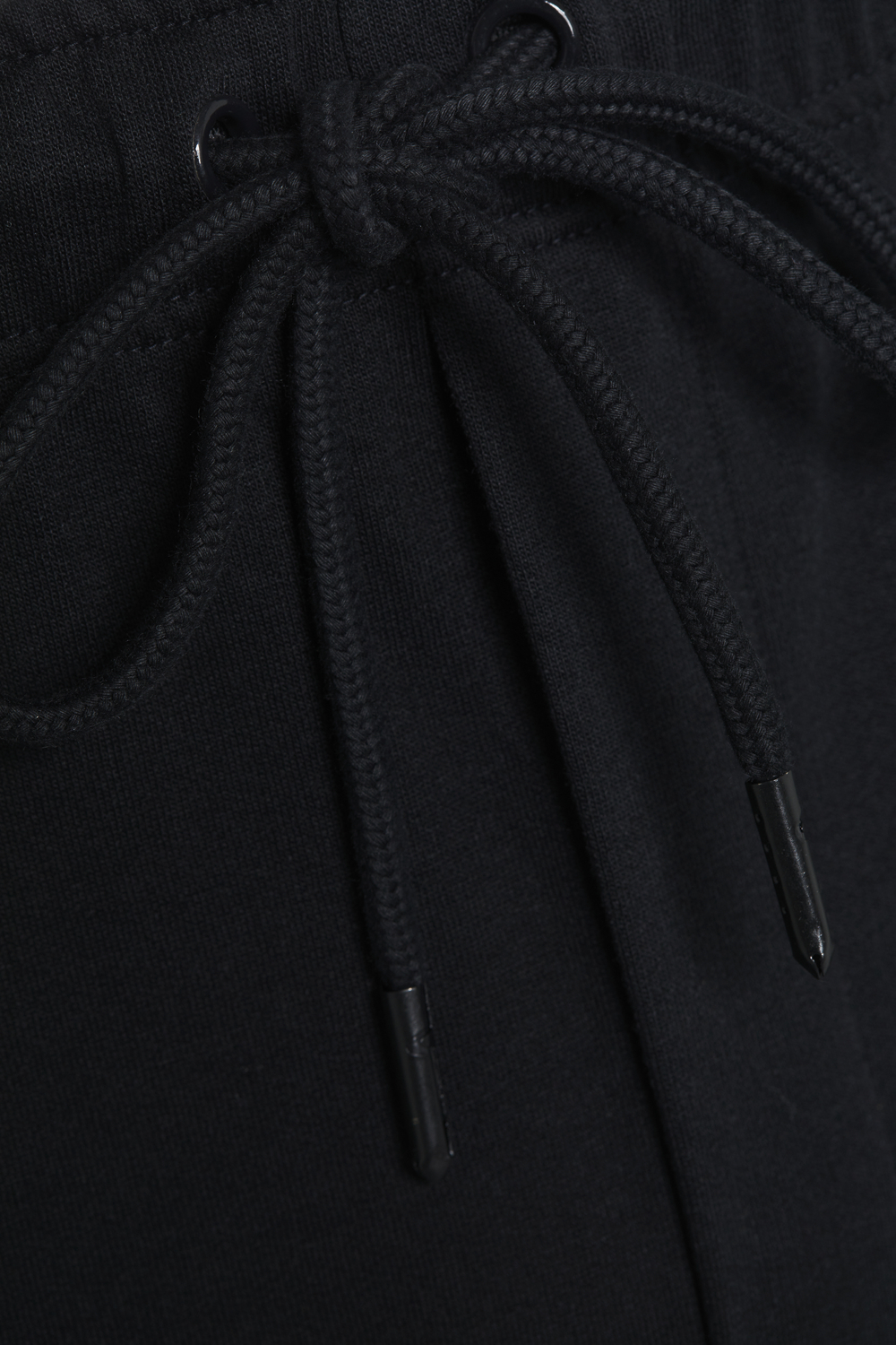 Detailbild Hose lang mit Bündchen von Comazo in der Farbe Schwarz mit Kordelzug und seitlichen Eingriffstaschen