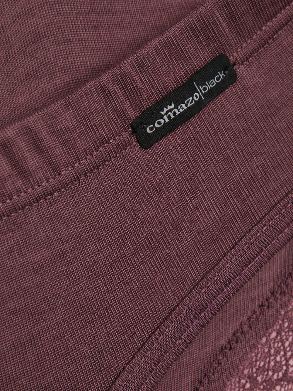Detailbild Wolle-Seide Jazz-Pants von Comazo in der Farbe Kastanie mit feiner Spitze an den hinteren Beinabschlüssen, Wolle aus garantiert schonender Schermethode