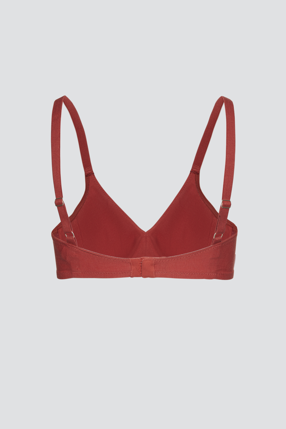 Produktbild Rückansicht Frau trägt Fairtrade BH ohne Bügel von Comazo in der Farbe Cranberry