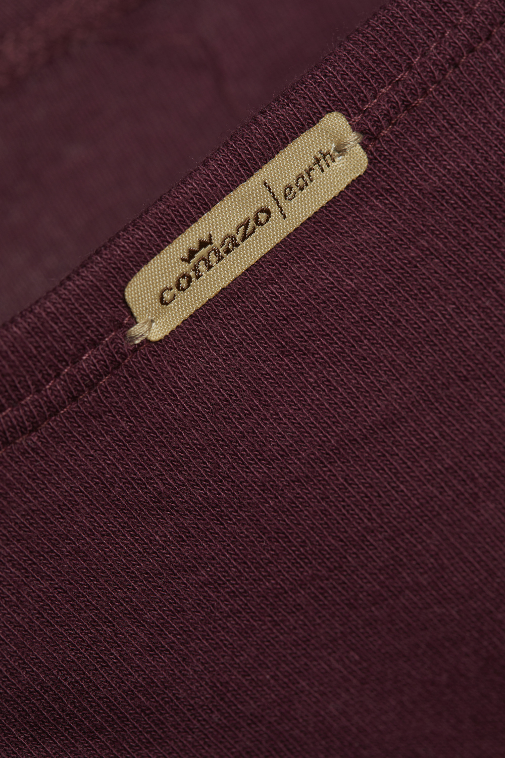 Detail image: Fairtrade jazz pants by Comazo in burgundy, made of 100% cotton in fine rib quality.