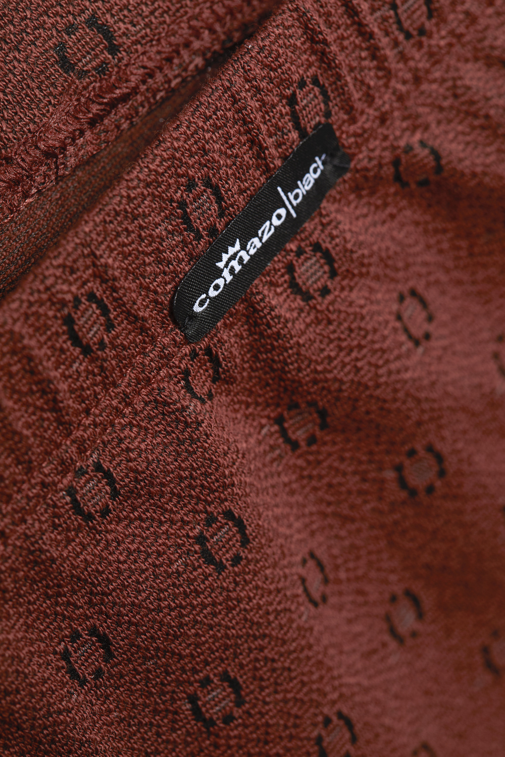 Detailbild Trunks von Comazo in der Farbe Cognak mit schwarzen Kreisen