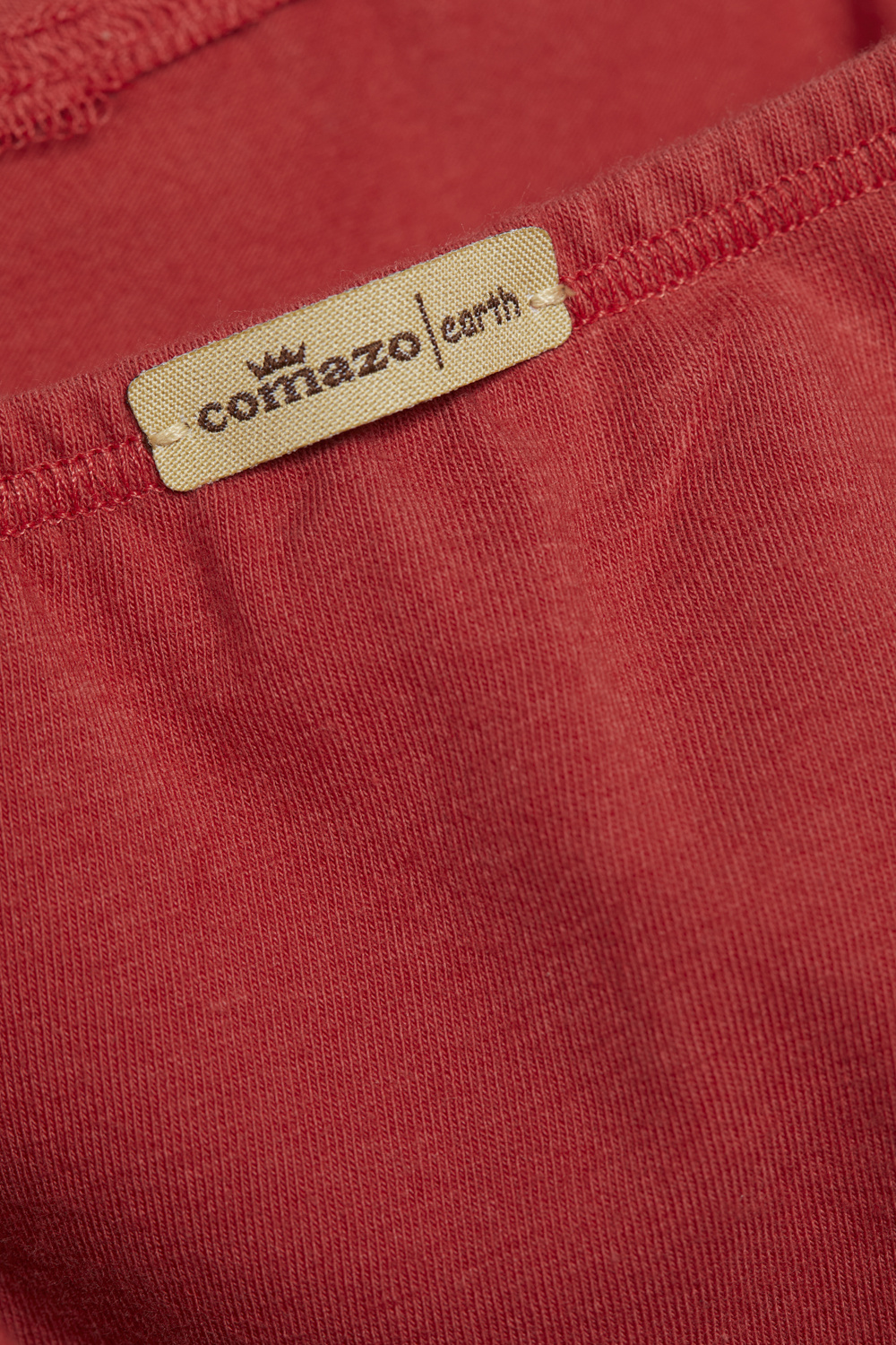 Detailbild Fairtrade Panty von Comazo in der Farbe Cranberry.