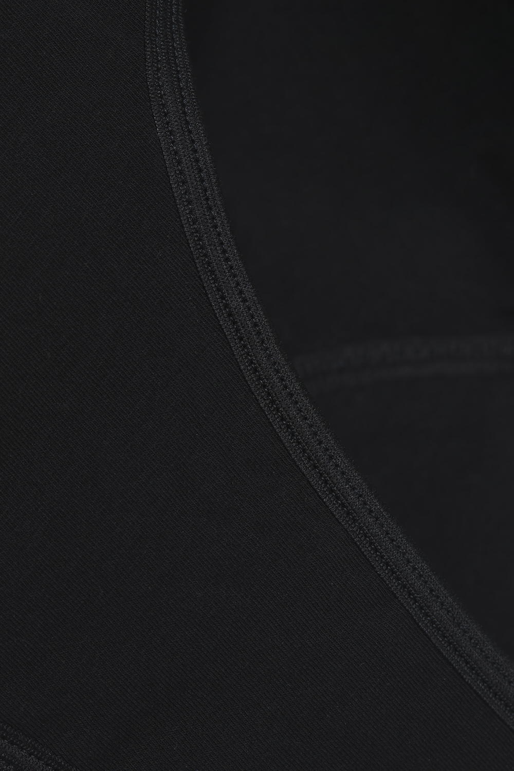 Detailbild Fairtrade Perioden-Slip "Medium" von Comazo in der Farbe Schwarz mit integriertem Auslaufschutz