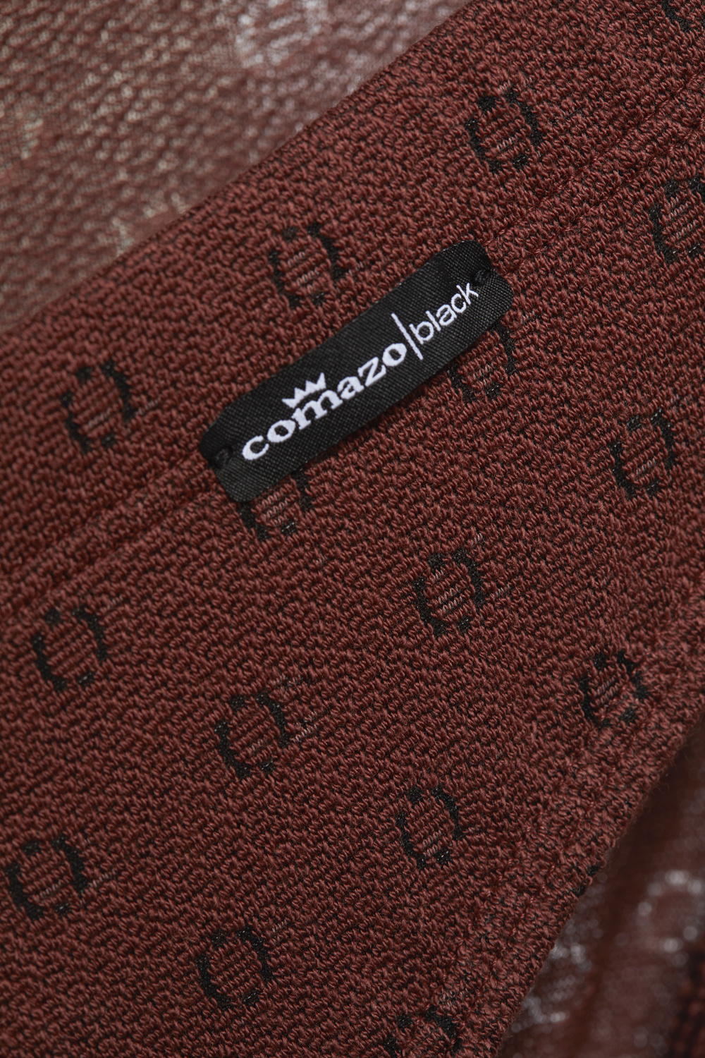 Detailbild Slip von Comazo in der Farbe Cognak mit schwarzen Kreisen