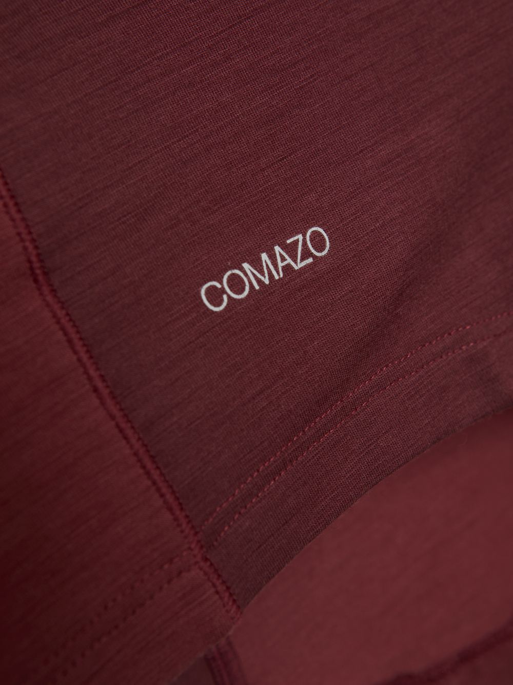 Detailbild Comazo Herren Shirt kurzarm aus Merinowolle Farbe Merlot/Porto