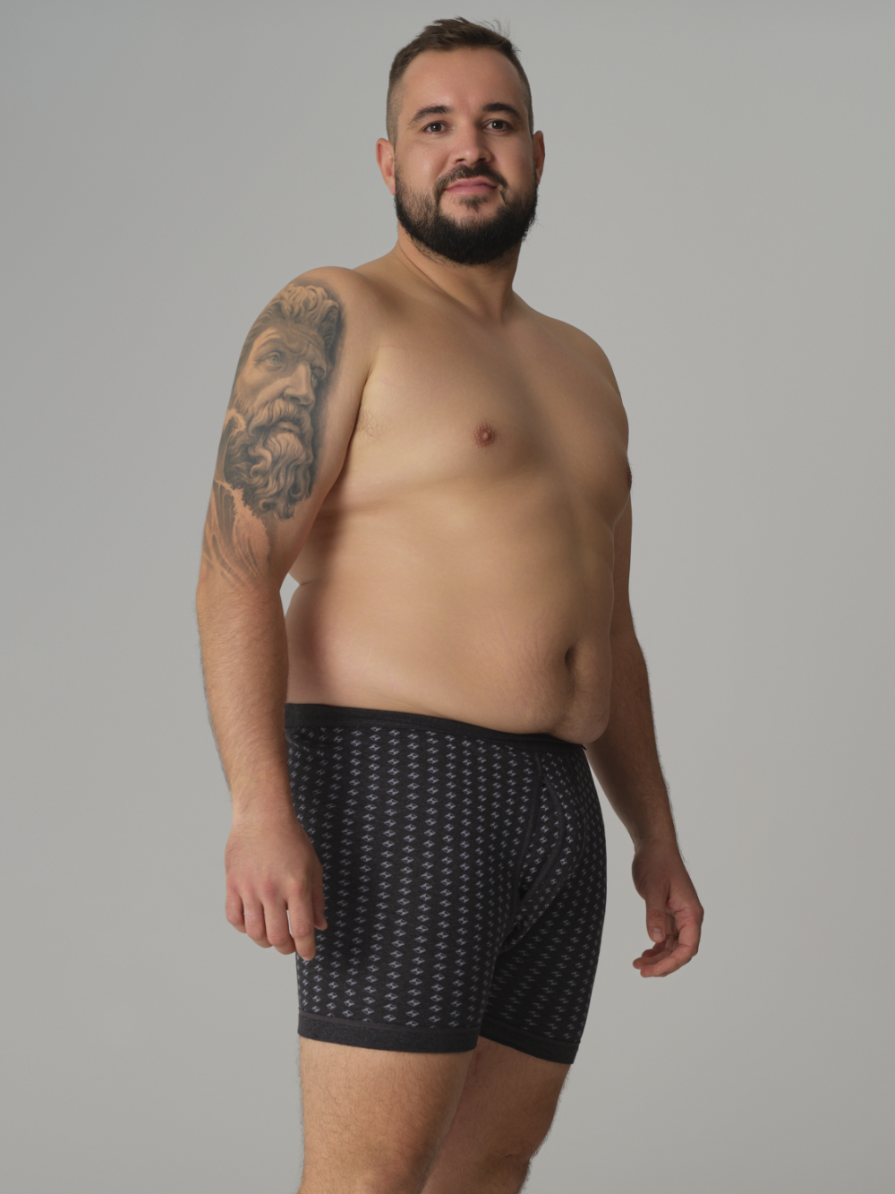 Vorderansicht: Mann trägt Comazo Unterhose kurz mit Eingriff Farbe Dunkelgrau-Melange gemustert