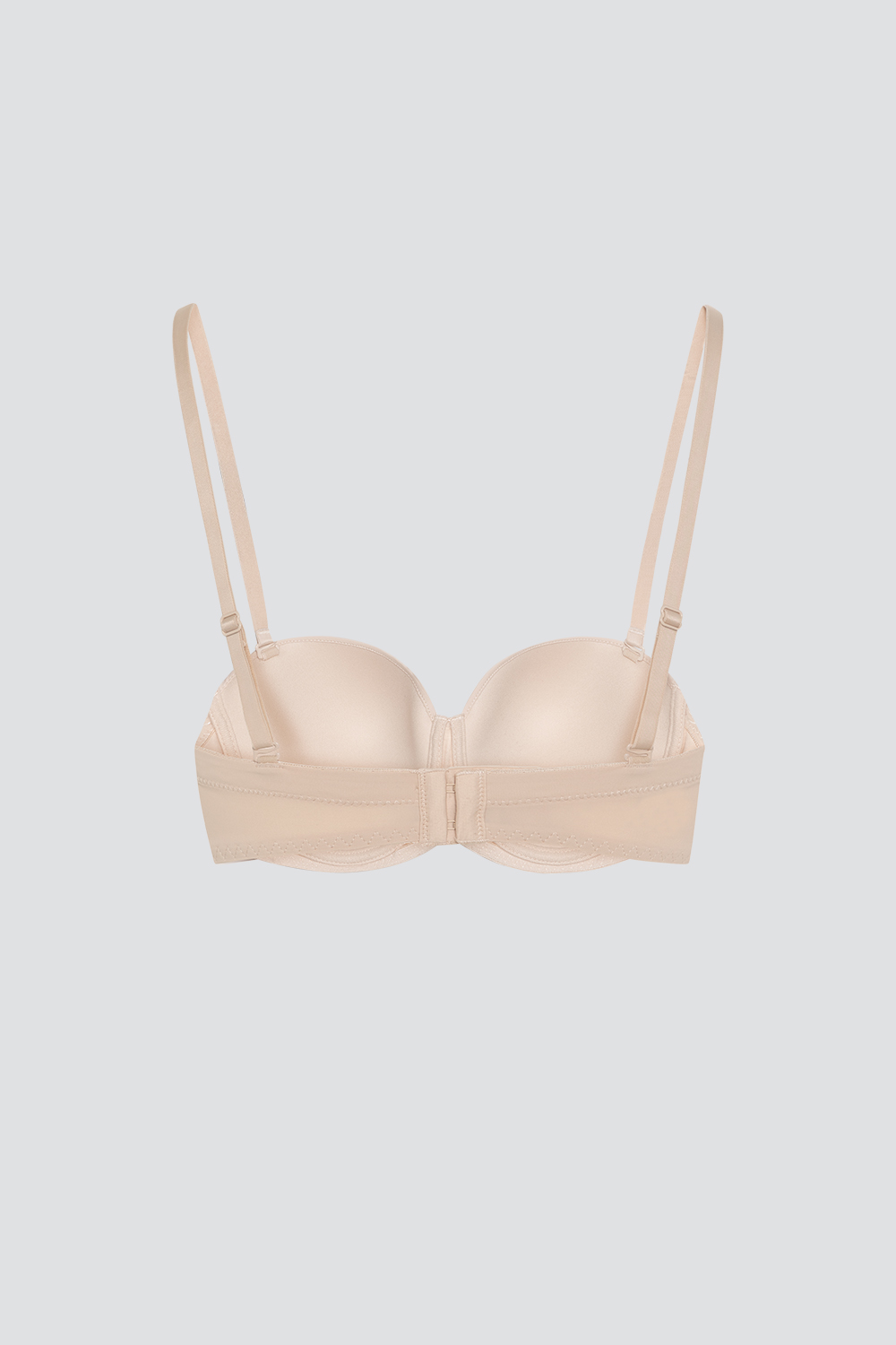 Produktbild Rückseite Bandeau-BH von Comazo in der Farbe Muschel mit abnehmbaren Trägern.