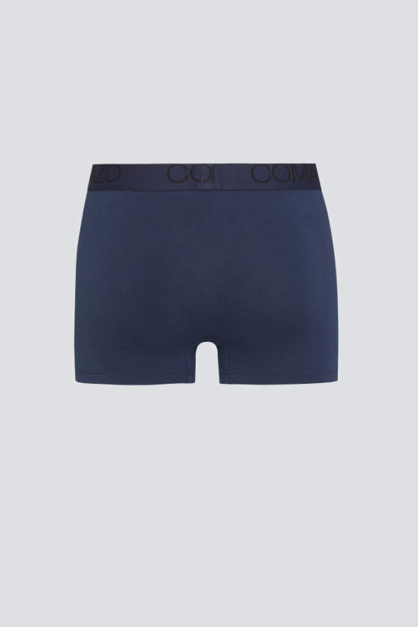 Produktbild Rückansicht Fairtrade Pants von Comazo in der Farbe Marine mit Webgummi mit Schriftzug