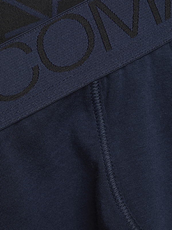 Detail view of long-leg underwear by Comazo in navy with logo waistband