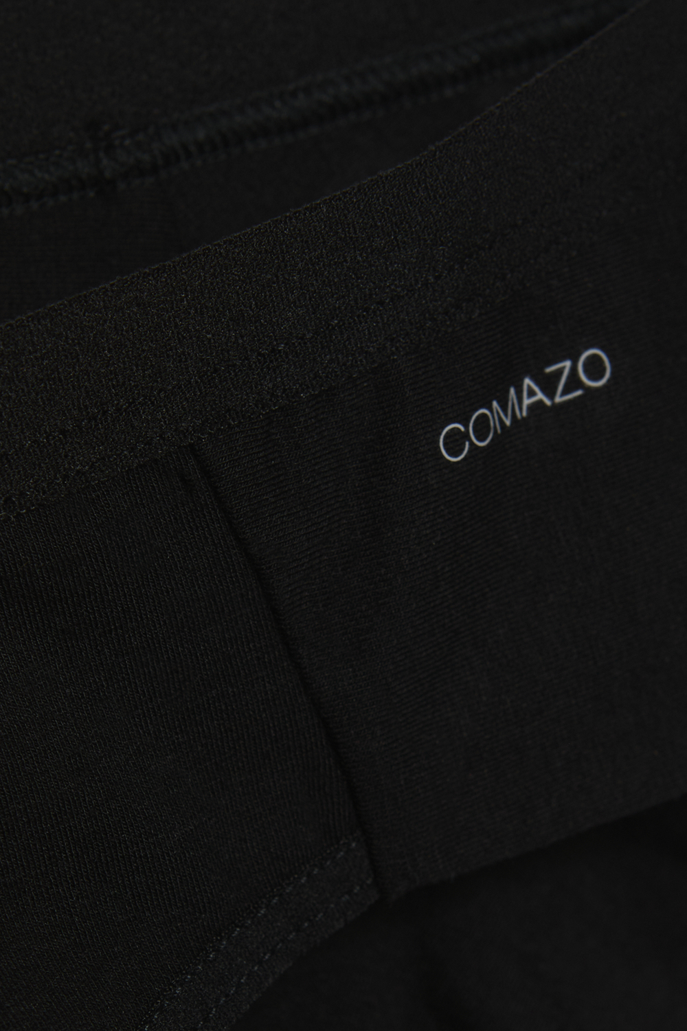 Detail view of Brazilian slip by Comazo in the color Black made from MicroModal®.