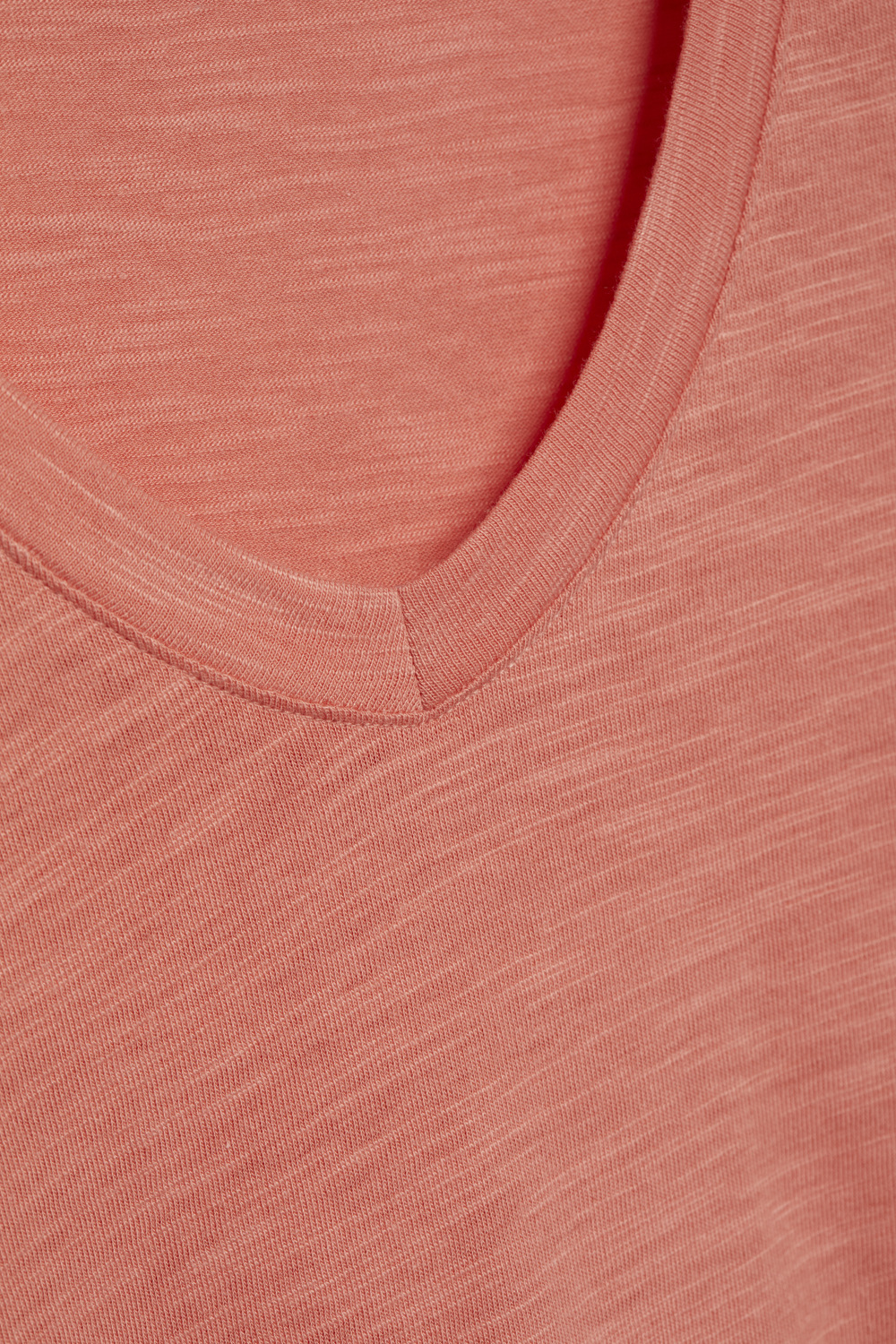 Detail image Comazo men's short-sleeve shirt made from slub yarn in papaya color.