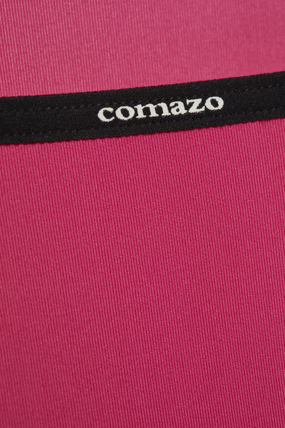 Detailbild Jazz-Pants low-cut mit Microfaser-Touch von Comazo in der Farbe Paradise Pink mit schwarzem Bund mit Comazo-Logo Druck