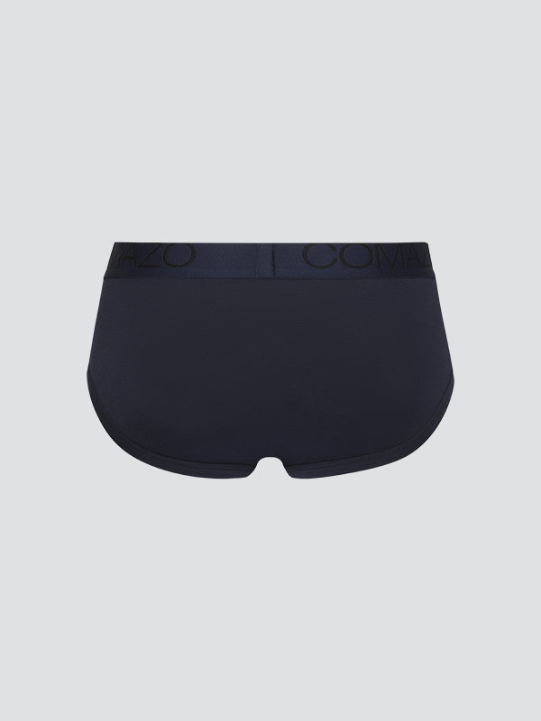 Product image rear view of retro briefs by Comazo in navy with logo waistband